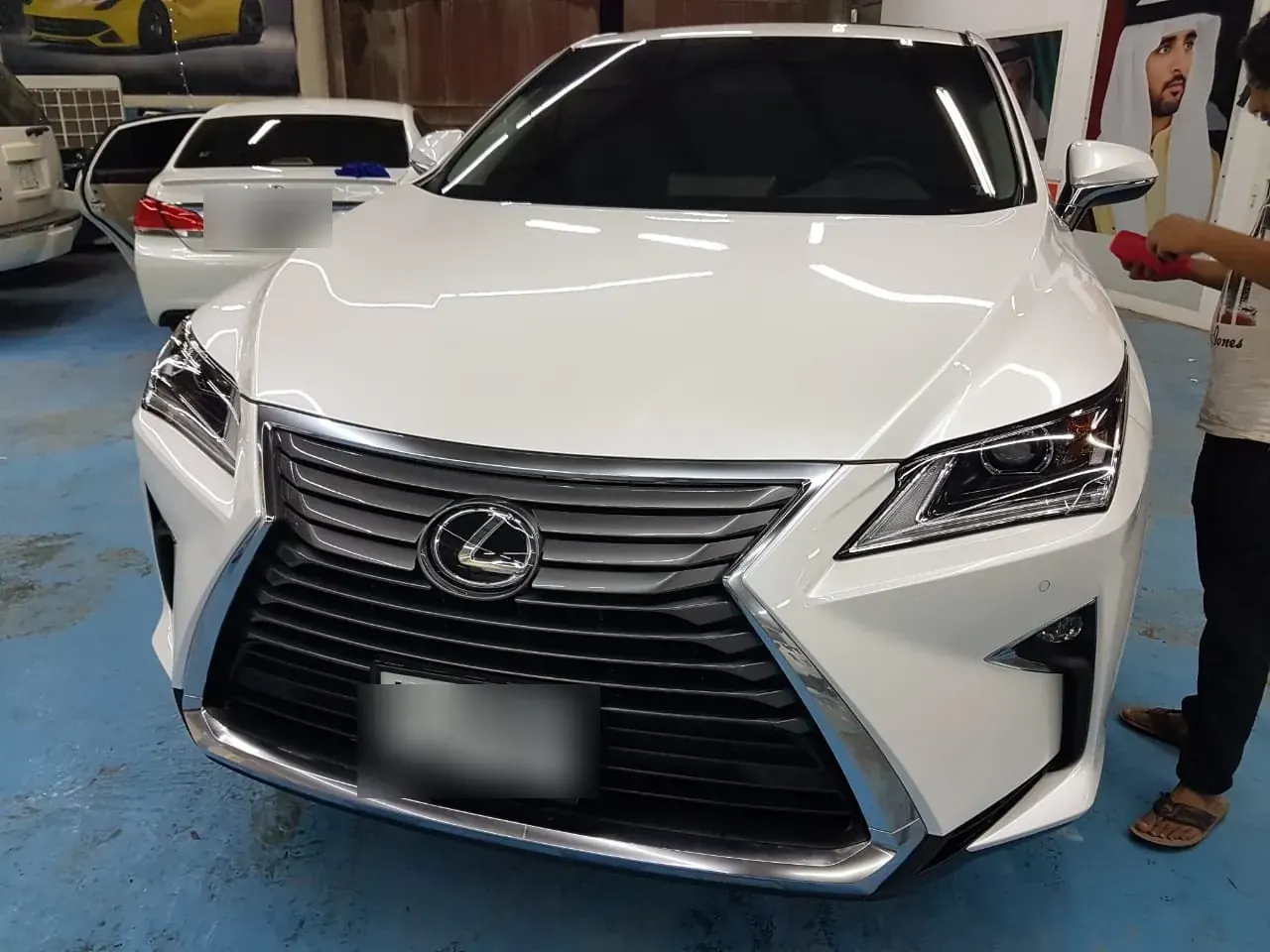White Lexus RX polished at Madeena Al Amwaj Auto Workshop